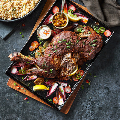 Slow roasted lamb shoulder topped with a spice crust served with fluffy basmati rice from Dawat Foods.