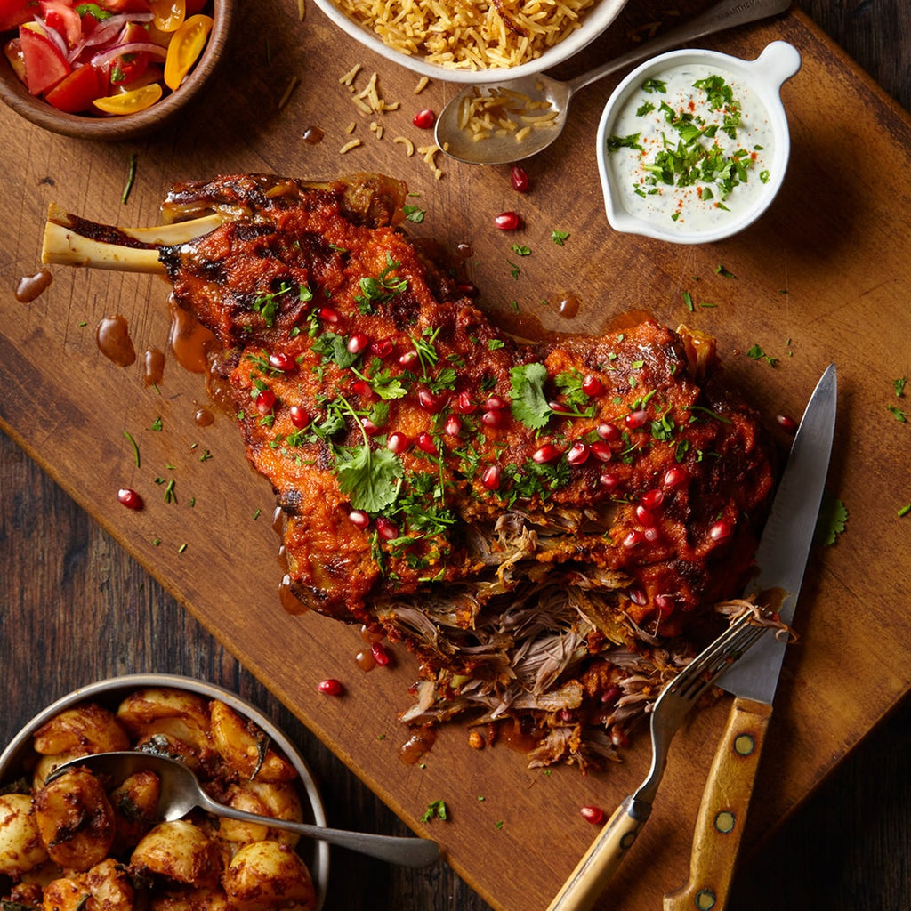 Slow Roasted Garlic & Red Pepper Shoulder of Lamb topped with a delicious red pepper and garlic glaze served with fluffy basmati rice from Dawat Foods.